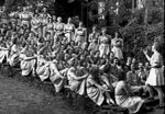 Photo of Girl Scouts sitting on Singing Steps at Edith Macy Conference Center. © GSUSA. All rights reserved.