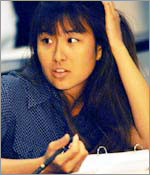 Photo of a girl doing homework.