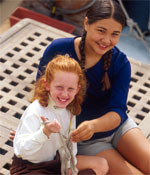 Photo of a Girl Scout and volunteer. &copy; GSUSA. All rights reserved. (Photographer: Lori Adamski-Peek)