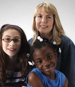 Photo of Girl Scout adult and girl members. &copy; GSUSA. All rights reserved. (Photographer: Quad Photo/Karineh Gurjian-Angelo/Dedjora Von Jutaz)