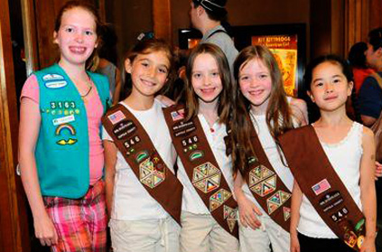 Girl Scouts pose at a special screening of Kit Kittredge: An American Girl starring Abigail Breslin, on Thursday June 19 in Times Square, New York.