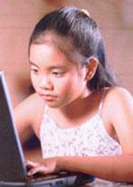 Photo of a girl with laptop computer.