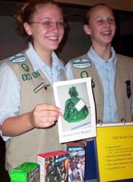 Photo of Girl Scouts 11-17 with cookies. (Courtesy of Girl Scouts-Totem Council)