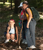 Photo of girls hiking with backpacks. &copy; GSUSA. All rights reserved. (Photographer: Quad Photo/Karineh Gurjian-Angelo/Dedjora Von Jutaz)