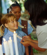 Photo of a Girl Scout pinning ceremony. &copy; GSUSA. All rights reserved. (Photographer: Lori Adamski-Peek)