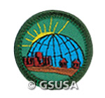 The World in My Community Badge. &copy; GSUSA. All rights reserved.