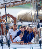 Photo of Girl Scouts standing on a boat. &copy; GSUSA. All rights reserved. (Photographer: Lori Adamski-Peek. Courtesy of Pilgrim of Newport, Long Beach, California.)