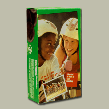 Photo of 1960s cookie boxes. &copy; GSUSA. All rights reserved.