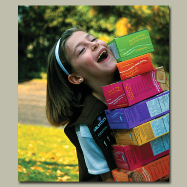 Photo of cookie boxes from the 2000s. &copy; GSUSA. All rights reserved.