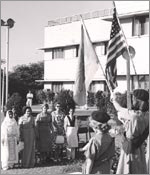 Photo Girl Scouts holding flags in Pakistan, 1961. © GSUSA. All rights reserved.