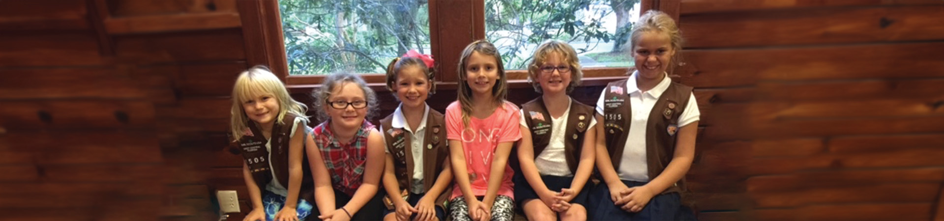  a troop of Brownie Girl Scouts 